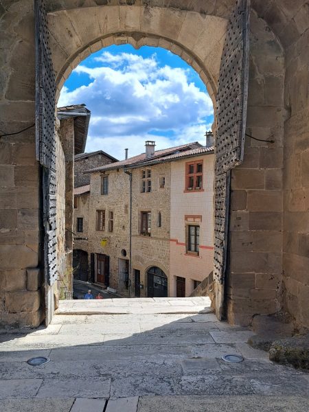 Stroll through the village's narrow streets and porches 