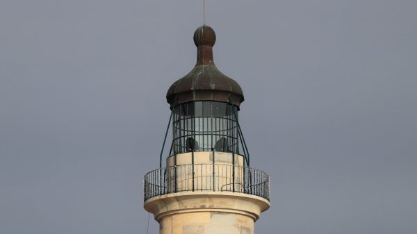 Old lighthouse with copper lantern