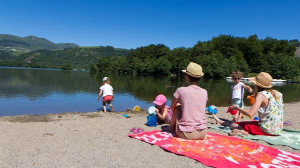 Peaceful swimming on Lake Chambon, at Murol beach