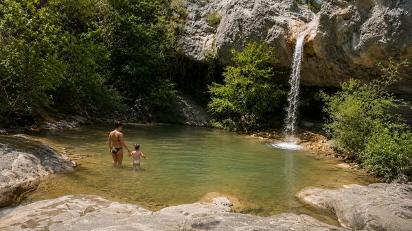 Paddling at the foot of the waterfall...